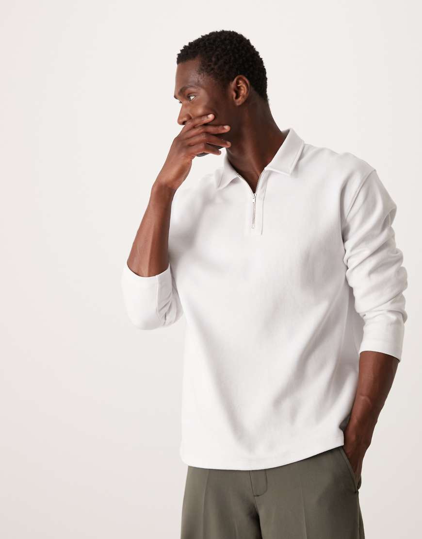 ASOS DESIGN - Langärmliges, locker geschnittenes Poloshirt aus Interlock-Stoff in Weiß mit Reißverschluss von ASOS DESIGN