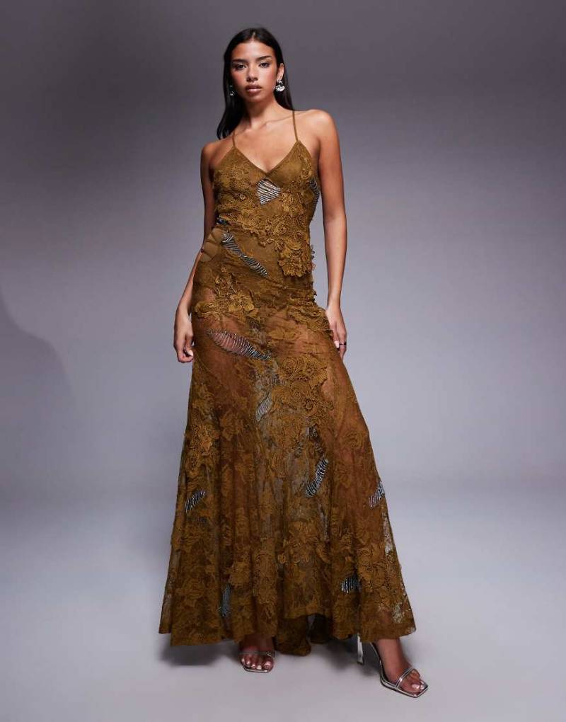 ASOS DESIGN - Premium - Maxikleid aus Spitze mit Applikationen und baumelnden Fransen-Goldfarben von ASOS DESIGN