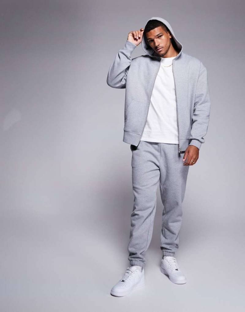 ASOS DESIGN - Premium - Schwere, schmal zulaufende Jogginghose in Grau meliert, 400 g/m² von ASOS DESIGN