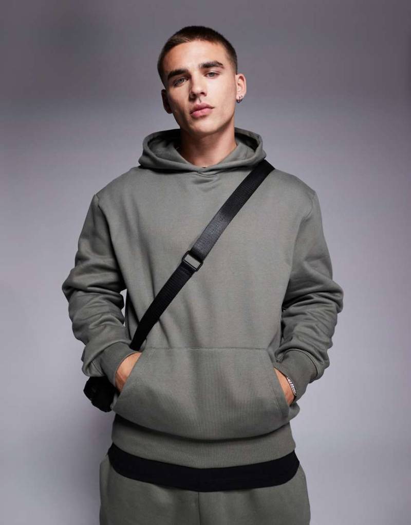 ASOS DESIGN - Premium - Schwerer Oversize-Kapuzenpullover in Khaki, 400 g/m²-Grün von ASOS DESIGN