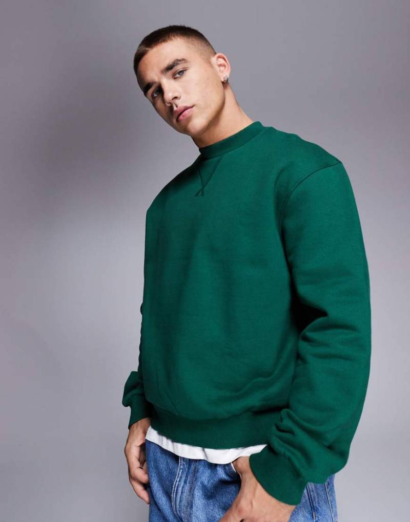 ASOS DESIGN - Premium - Schweres Oversize-Sweatshirt in Dunkelgrün mit kastigem Schnitt, 400 g/m² von ASOS DESIGN