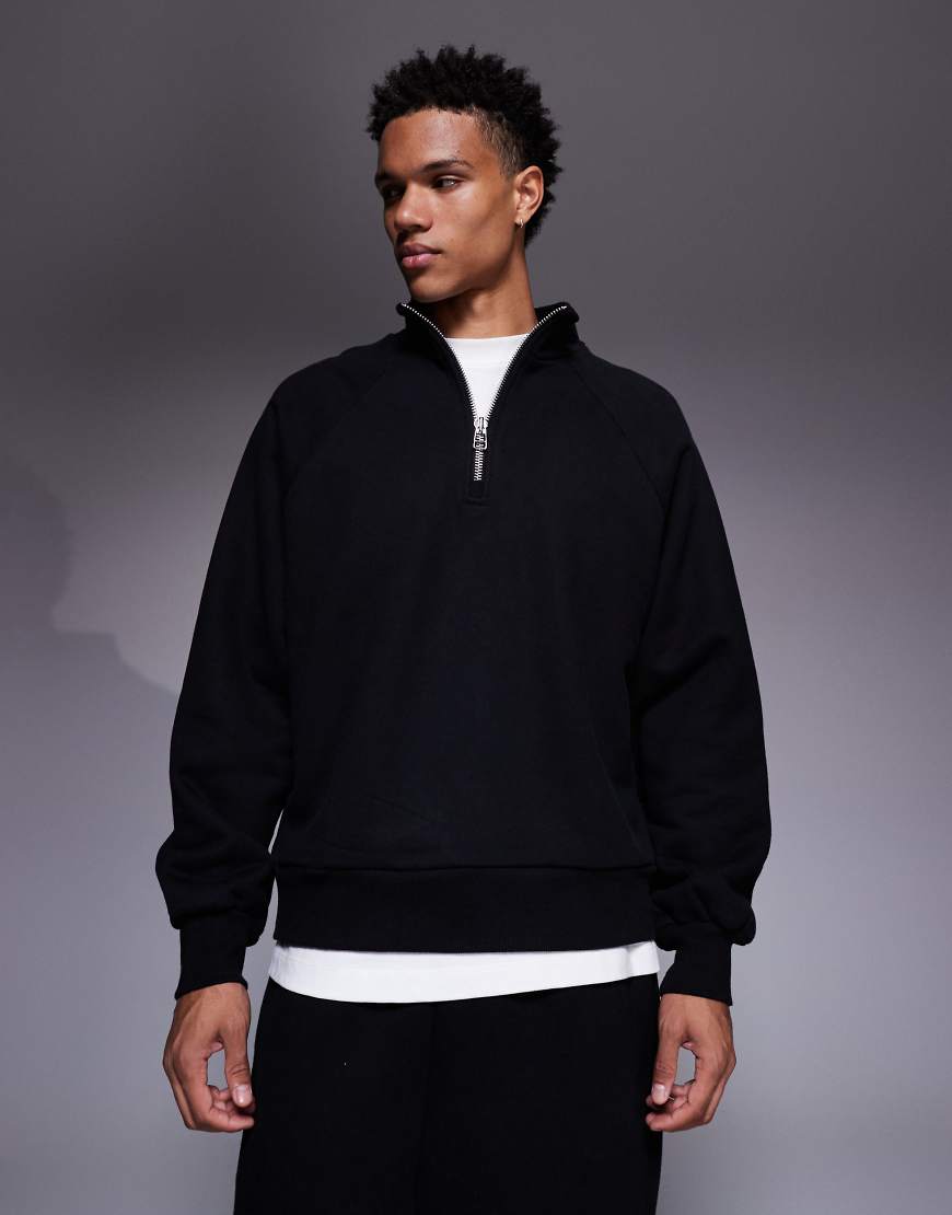 ASOS DESIGN - Premium - Schweres Oversize-Sweatshirt in Schwarz mit kurzem Reißverschluss, 650 g/m² von ASOS DESIGN