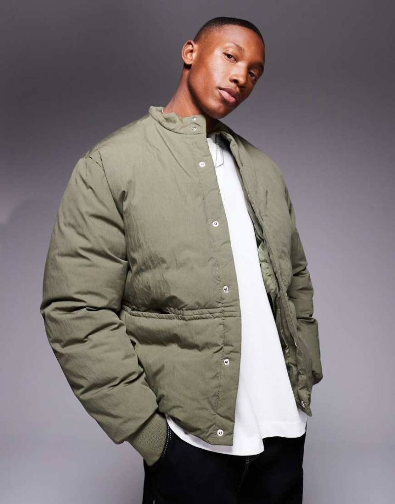 ASOS DESIGN - Pufferjacke in Grün mit gerippten Bündchen und verdeckten Taschen von ASOS DESIGN