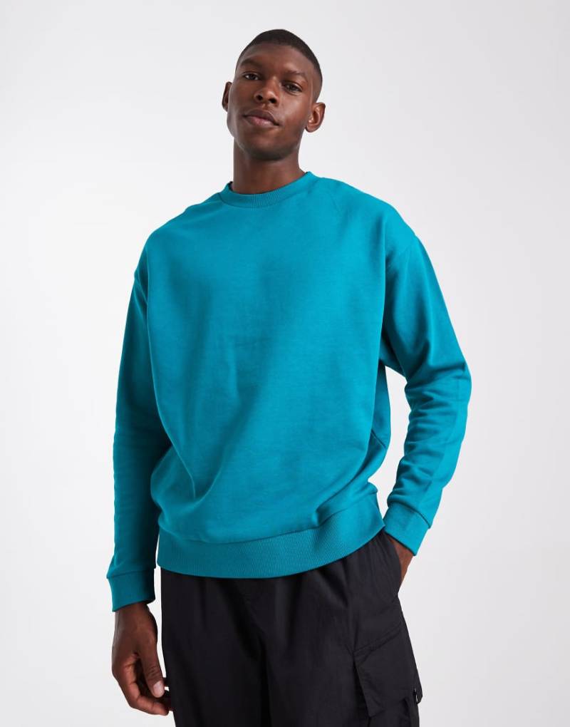 ASOS DESIGN - Basic-Sweatshirt in Blau mit Oversize-Schnitt von ASOS DESIGN