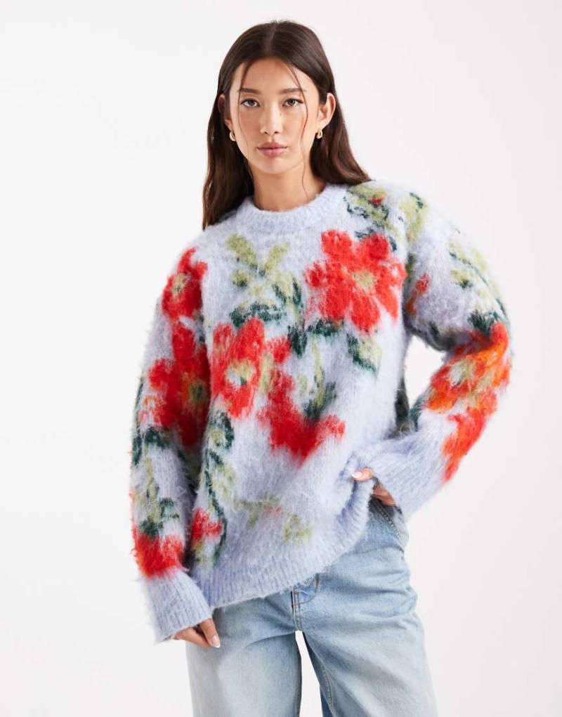 ASOS DESIGN - Pullover in Blau mit verschwommenem Blumenmuster, Oversize-Passform und Rundhalsausschnitt von ASOS DESIGN