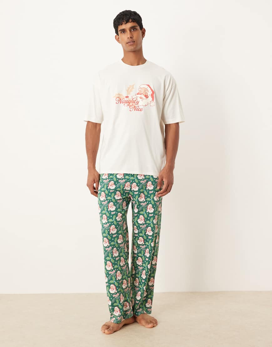 ASOS DESIGN - Pyjama in Blau mit Weihnachtsmann-Grafik im Retro-Design-Grün von ASOS DESIGN