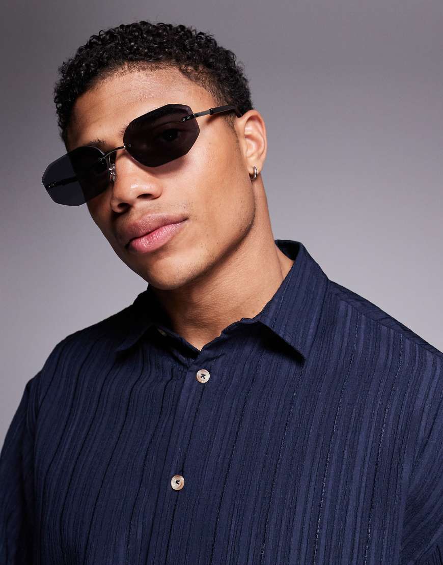 ASOS DESIGN - Festival - Rechteckige, randlose Sonnenbrille mit schwarzen Gläsern und silberfarbenem Metallgestell im Stil der 90er von ASOS DESIGN