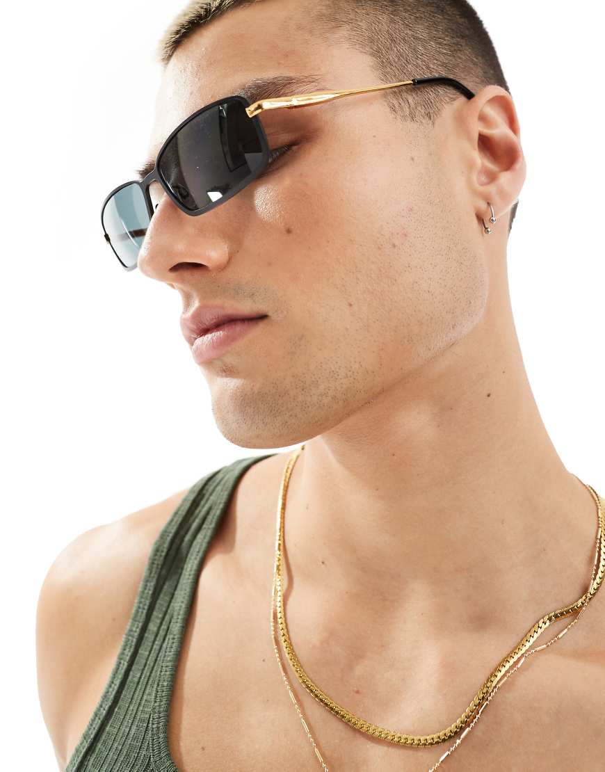 ASOS DESIGN - Rechteckige Sonnenbrille in mattem Schwarz mit Bügeln in Gold von ASOS DESIGN