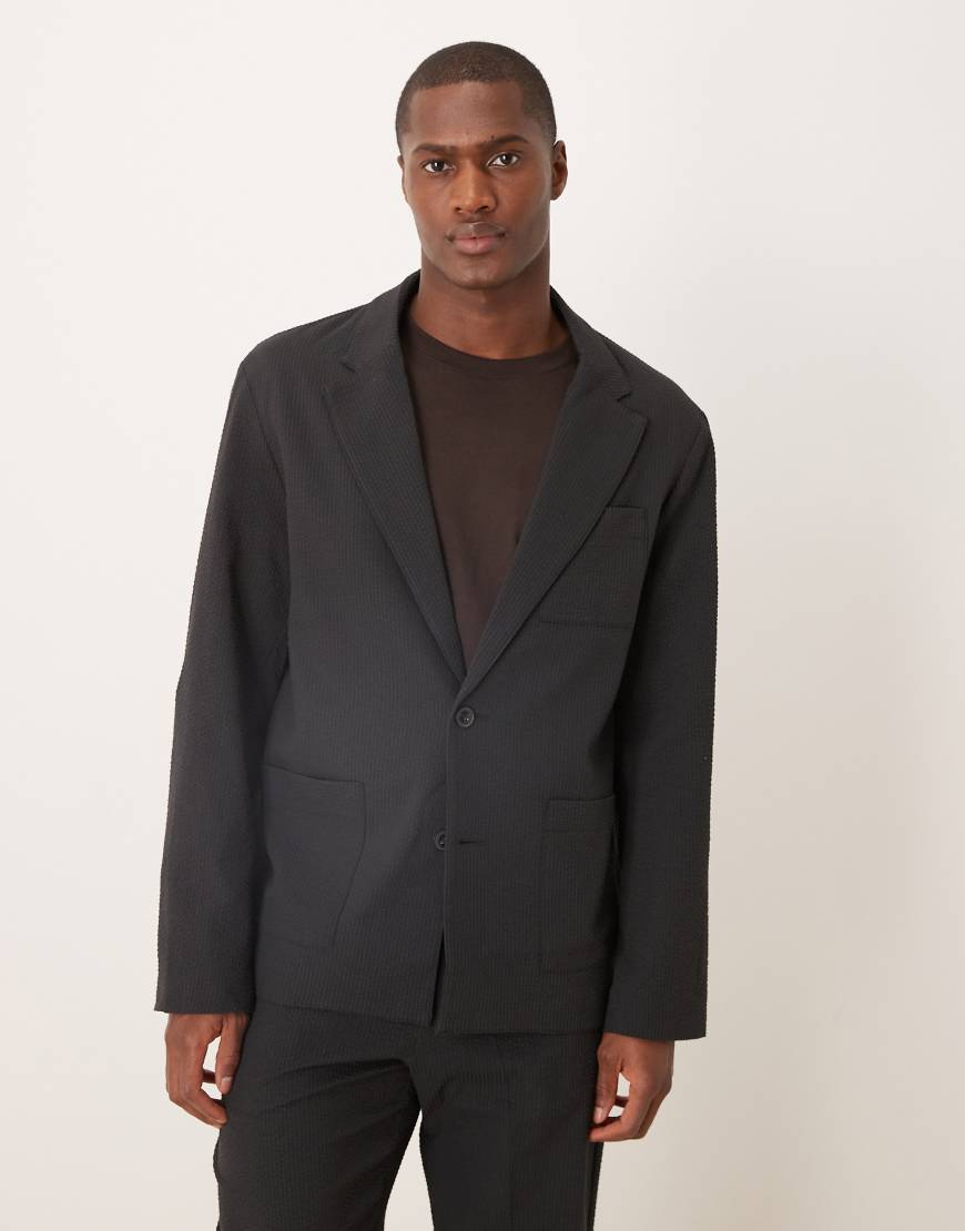 ASOS DESIGN - Regulär geschnittene Anzugjacke aus schwarzem Seersucker-Grau ASOS DESIGN - Regulär geschnittene Anzugjacke aus schwarzem Seersucker-Grau von ASOS DESIGN