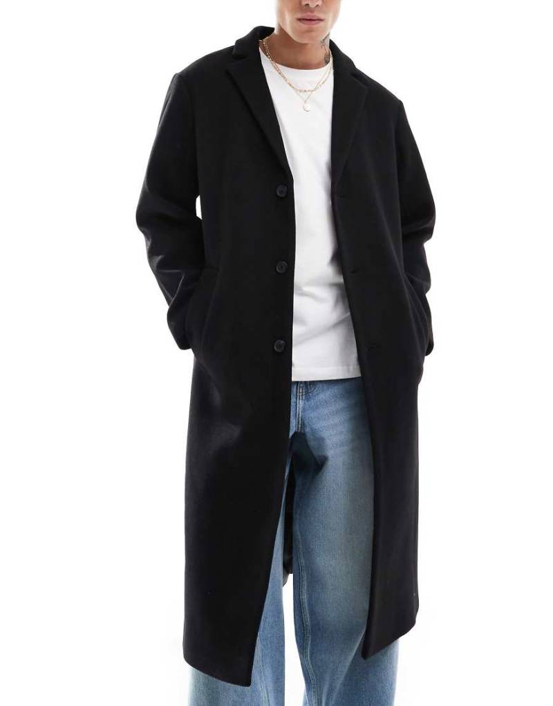 ASOS DESIGN - Regulär geschnittener Mantel in schwarzer Woll-Optik von ASOS DESIGN