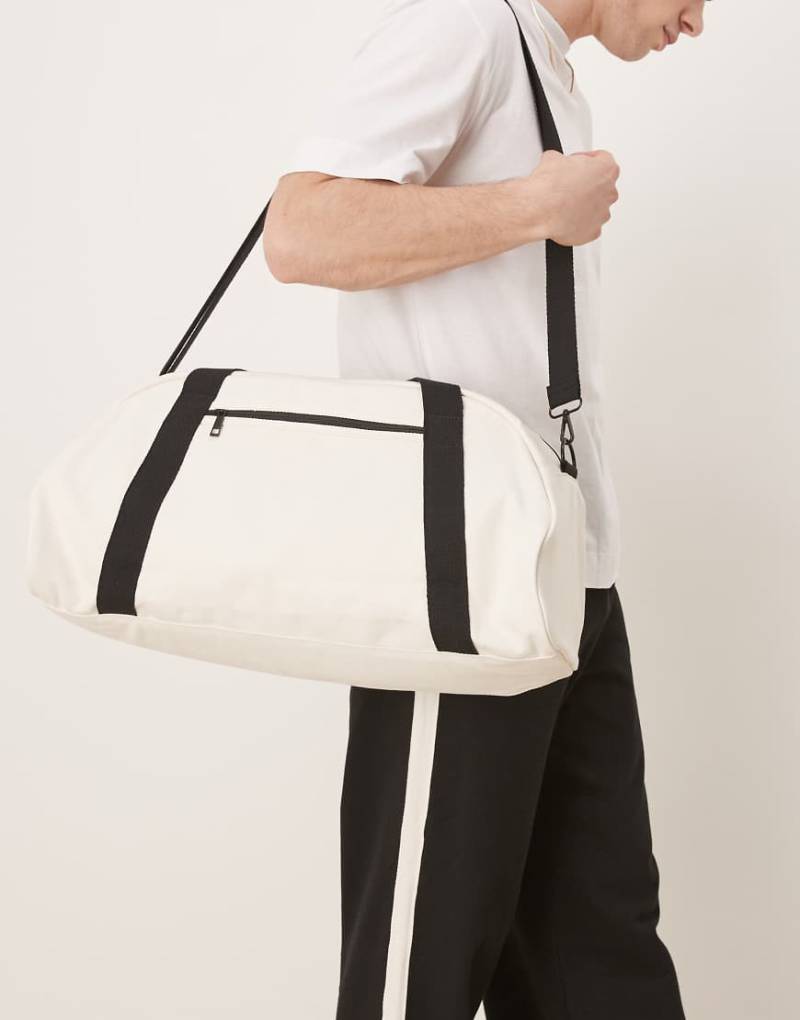 ASOS DESIGN - Reisetasche aus Canvas in Schwarz und Ecru-Weiß von ASOS DESIGN