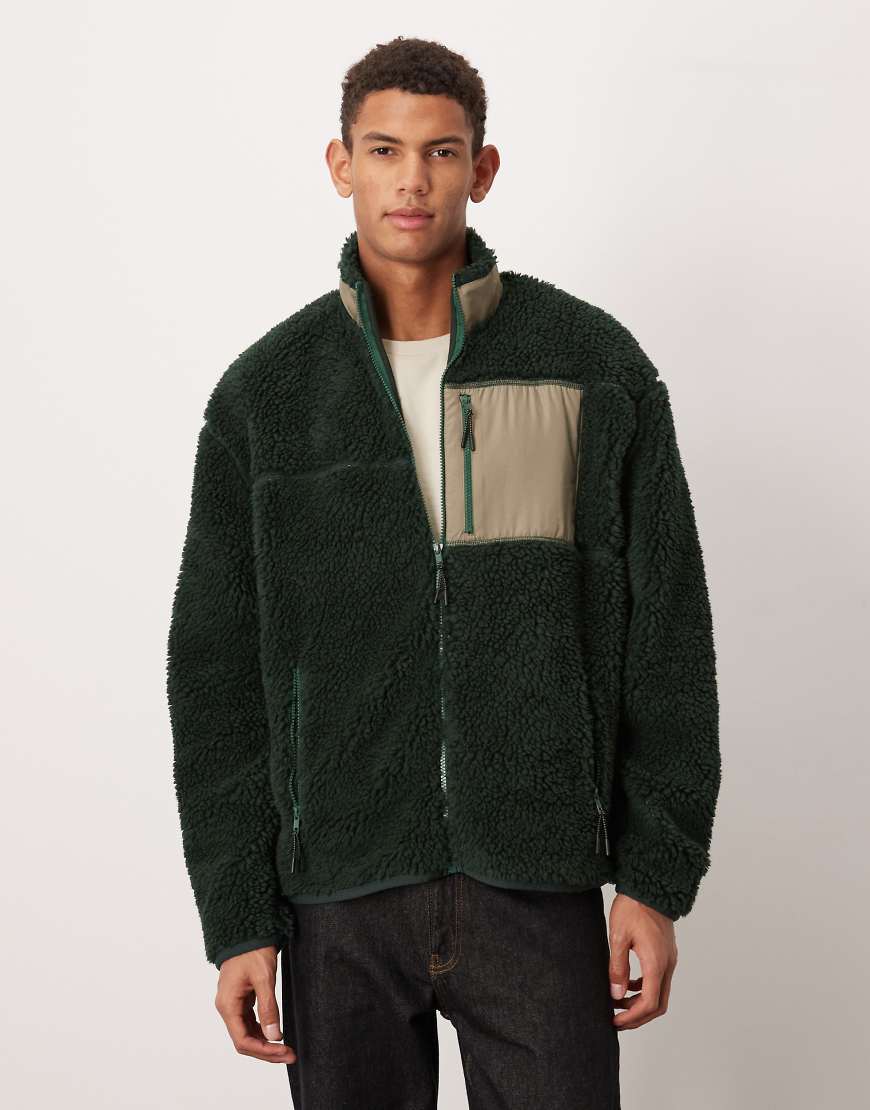 ASOS DESIGN - Relaxed Fit-Jacke aus Teddyfell in Dunkelgrün mit Reißverschluss und Tasche von ASOS DESIGN