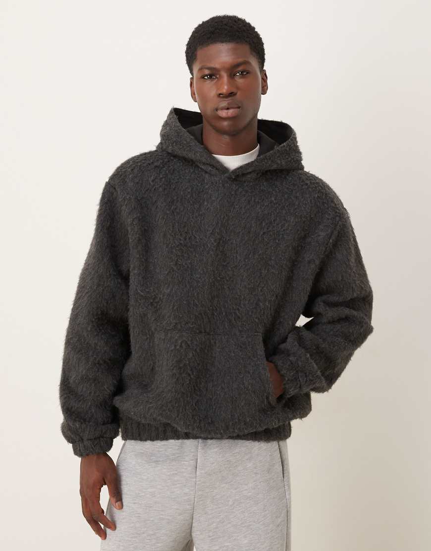 ASOS DESIGN - Relaxed Fit Kapuzenpullover in Anthrazit mit angerauter Struktur-Grau von ASOS DESIGN