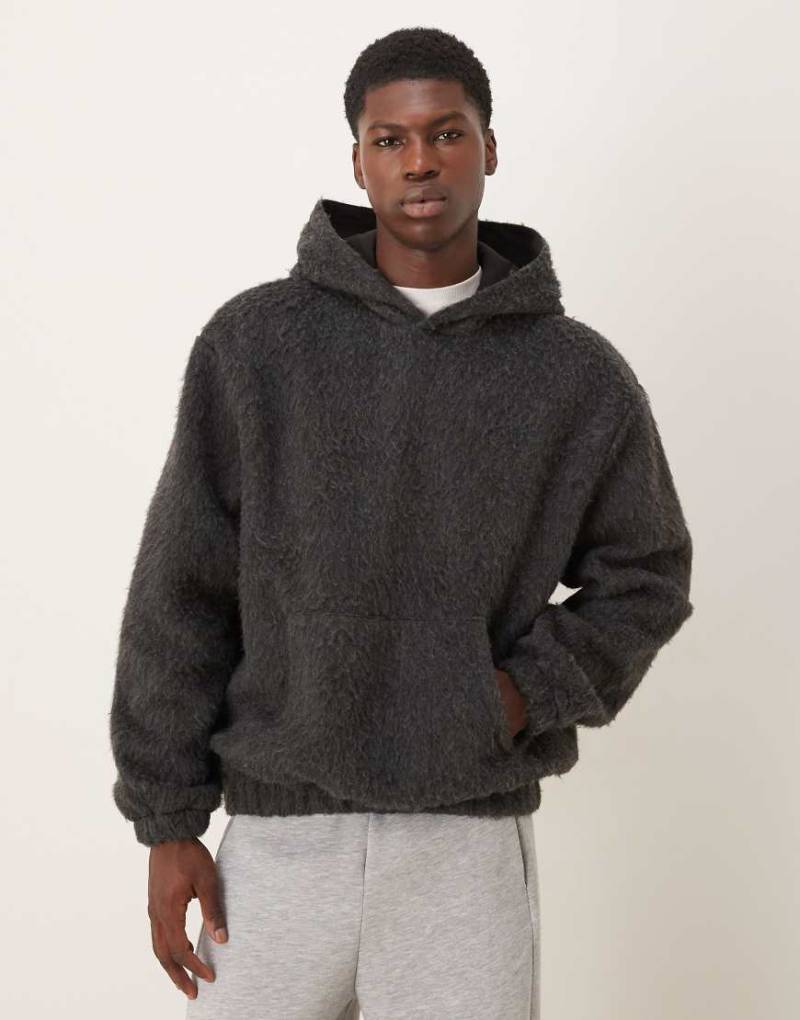 ASOS DESIGN - Relaxed Fit Kapuzenpullover in Anthrazit mit angerauter Struktur-Grau von ASOS DESIGN