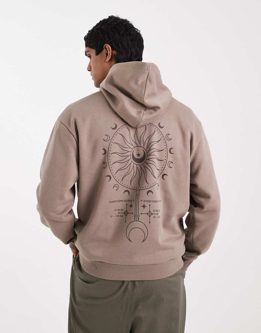 ASOS DESIGN - Relaxed-Fit-Kapuzenpullover in Braun mit Himmelskörper-Print-Brown von ASOS DESIGN