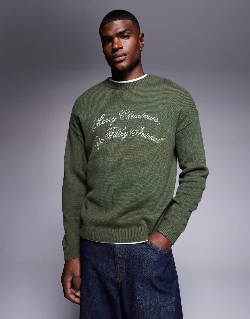ASOS DESIGN - Relaxed Fit Strickpullover in Grün mit „Merry Christmas Ya Filthy Animal"-Slogan ASOS DESIGN - Relaxed Fit Strickpullover in Grün mit „Merry Christmas Ya Filthy Animal"-Slogan von ASOS DESIGN
