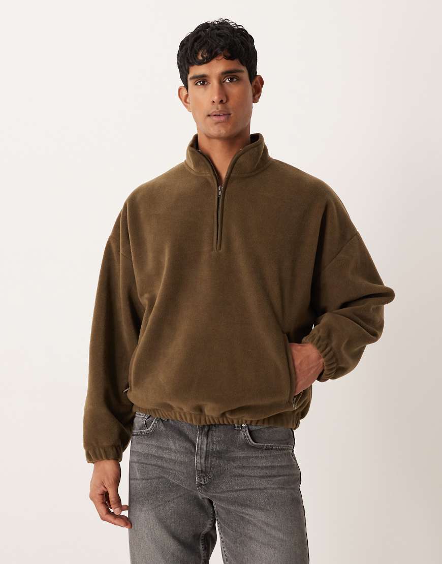 ASOS DESIGN - Relaxed Fit Sweatshirt in Khaki mit überschnittener Schulter und kurzem Reißverschluss-Grün von ASOS DESIGN