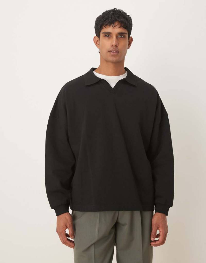 ASOS DESIGN - Relaxed Fit Sweatshirt in Schwarz mit Reverskragen von ASOS DESIGN