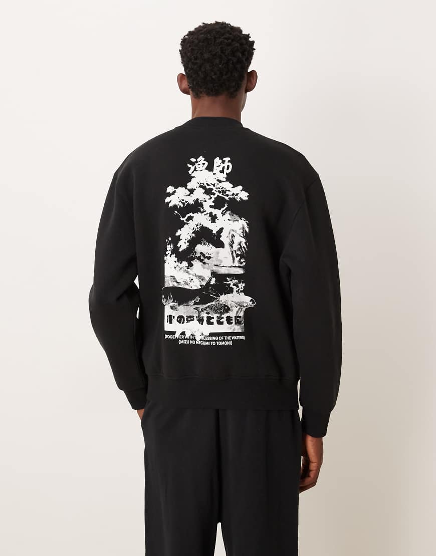 ASOS DESIGN - Relaxed-Fit-Sweatshirt in Schwarz mit Souvenir-Print von ASOS DESIGN
