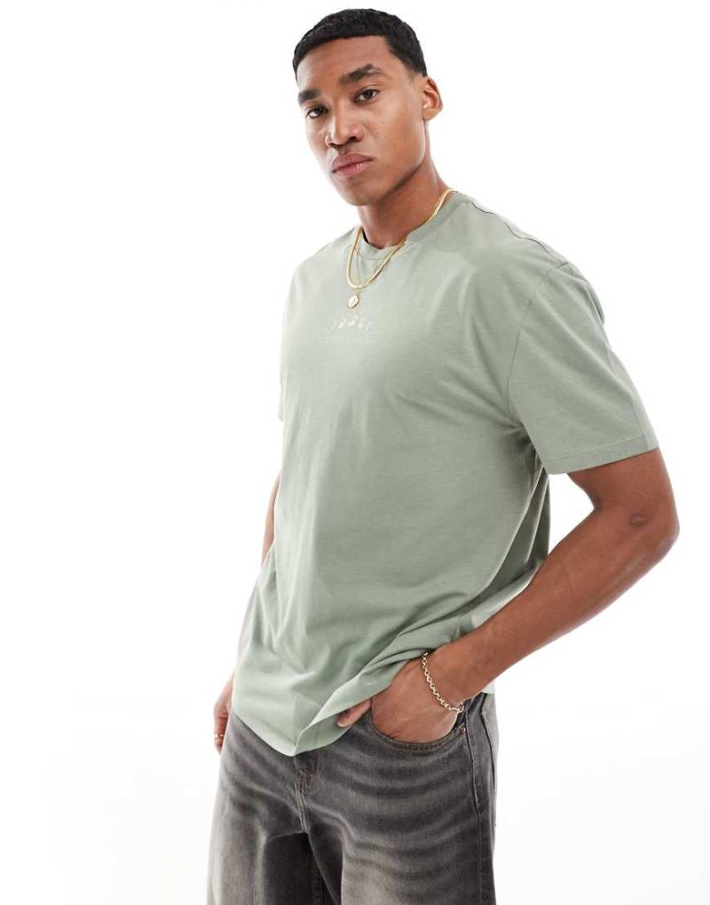 ASOS DESIGN - Relaxed-Fit-T-Shirt in Hellgrün mit Himmelskörper-Print von ASOS DESIGN