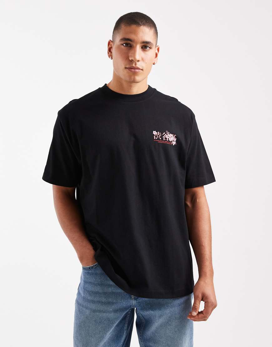 ASOS DESIGN - Relaxed-Fit-T-Shirt in Schwarz mit Blumengrafik auf der Brust von ASOS DESIGN