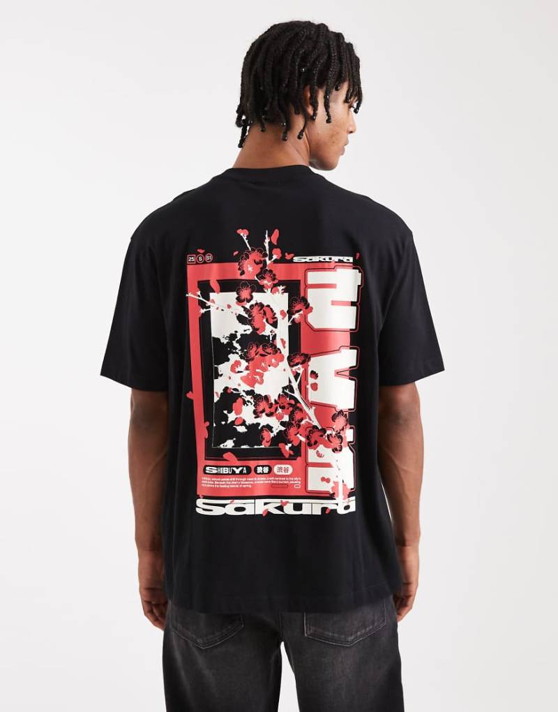 ASOS DESIGN - Relaxed-Fit-T-Shirt in Schwarz mit Souvenir-Grafik von ASOS DESIGN