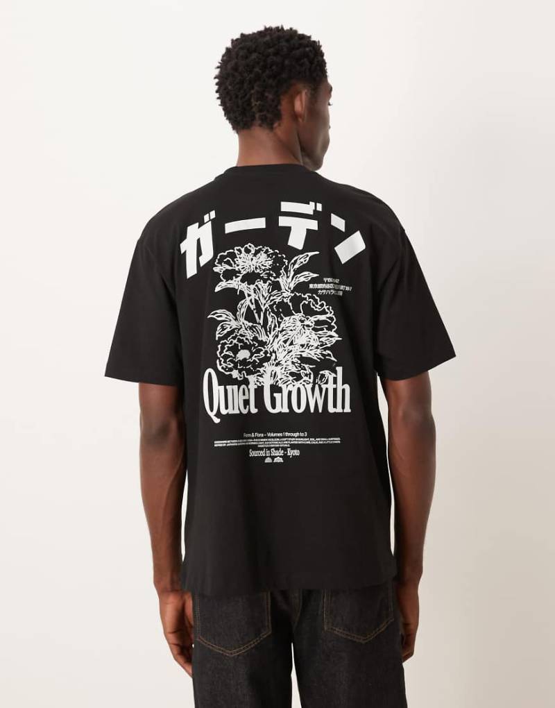 ASOS DESIGN - Relaxed-Fit-T-Shirt in Schwarz mit Souvenir-Print von ASOS DESIGN