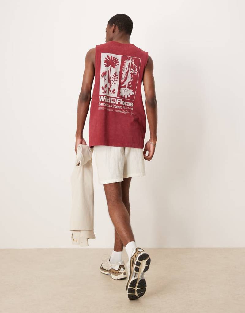 ASOS DESIGN - Schweres, locker geschnittenes Tanktop in verwaschenem Rot mit Blumen-Grafikprint von ASOS DESIGN