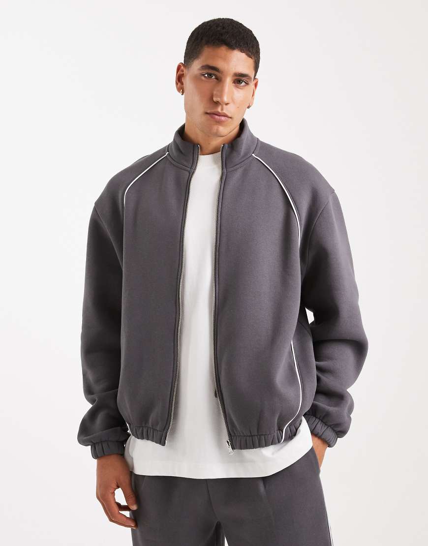 ASOS DESIGN - Relaxed-Fit-Trainingsjacke in Anthrazit mit Paspelierung-Grau von ASOS DESIGN