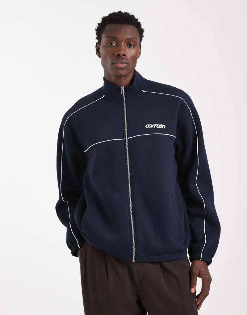 ASOS DESIGN - Relaxed-Fit-Trainingsjacke in Marineblau mit Print und Paspelierung von ASOS DESIGN