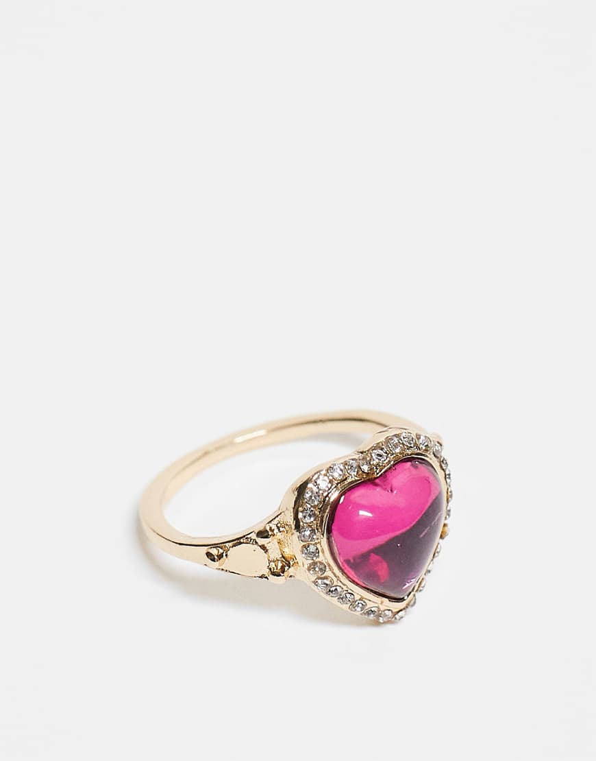 ASOS DESIGN - Ring in Goldoptik mit gefasstem rosa Herzstein-Goldfarben von ASOS DESIGN