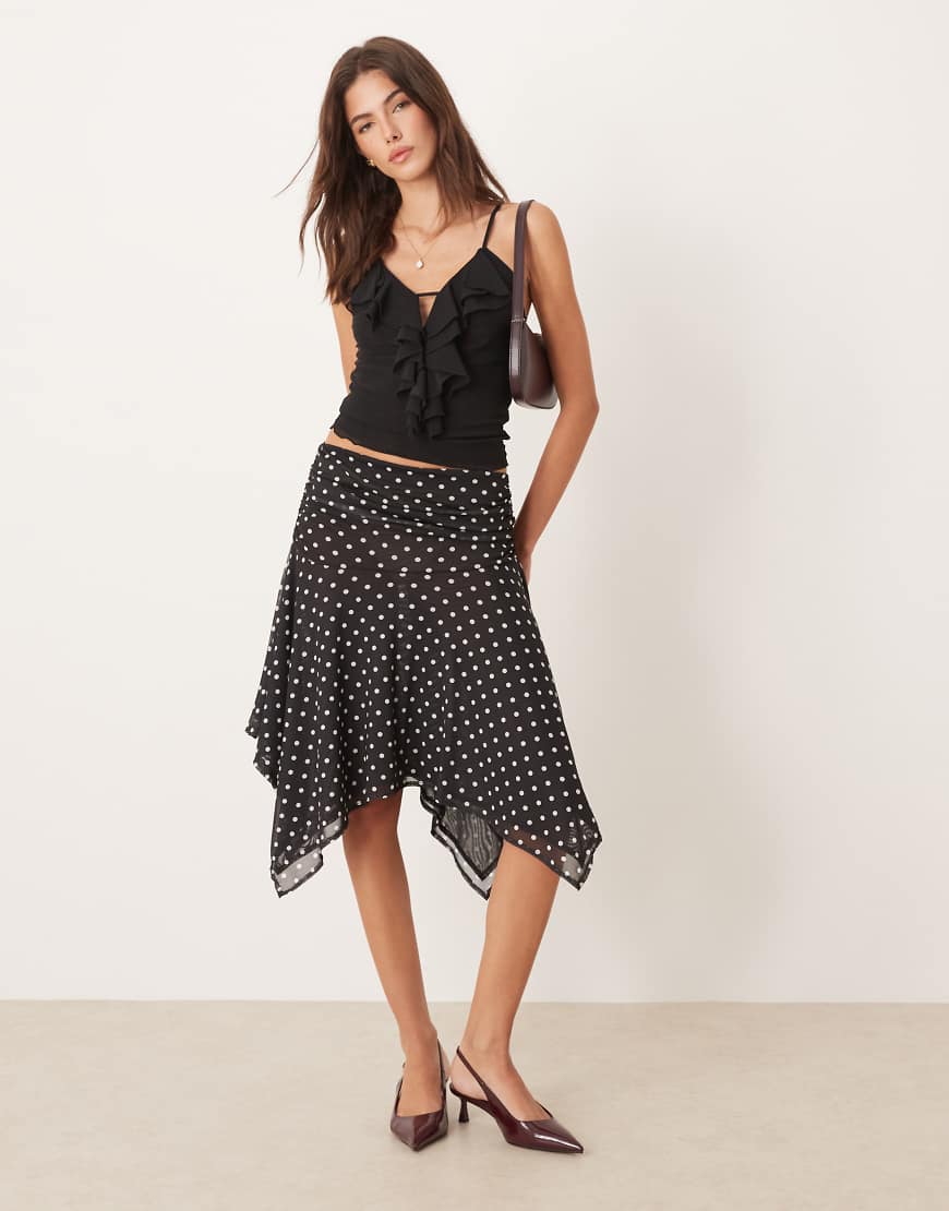 ASOS DESIGN - Rock aus Netzstoff in Schwarz und Weiß mit Punktemuster und Zipfelsaum-Bunt ASOS DESIGN - Rock aus Netzstoff in Schwarz und Weiß mit Punktemuster und Zipfelsaum-Bunt von ASOS DESIGN