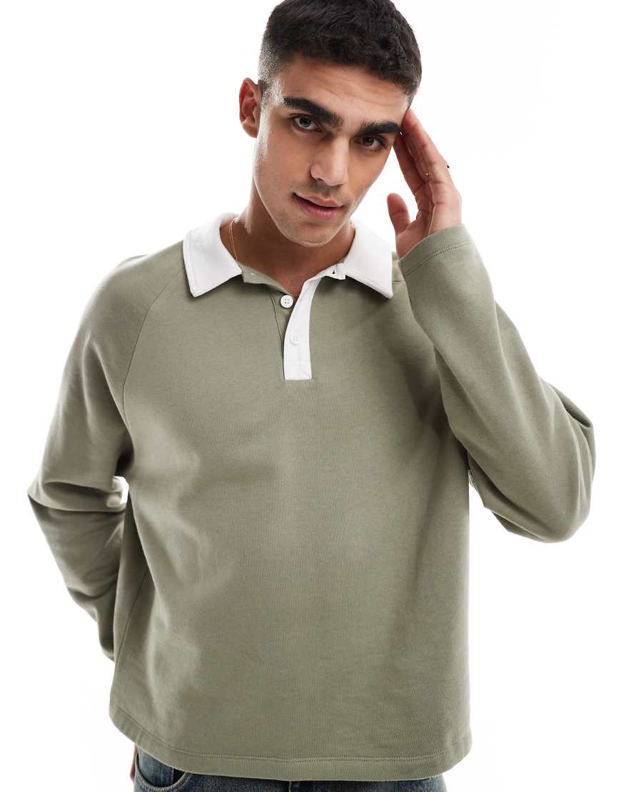 ASOS DESIGN - Rugby-Polo-Sweatshirt in Khaki mit Raglanärmeln-Grün von ASOS DESIGN
