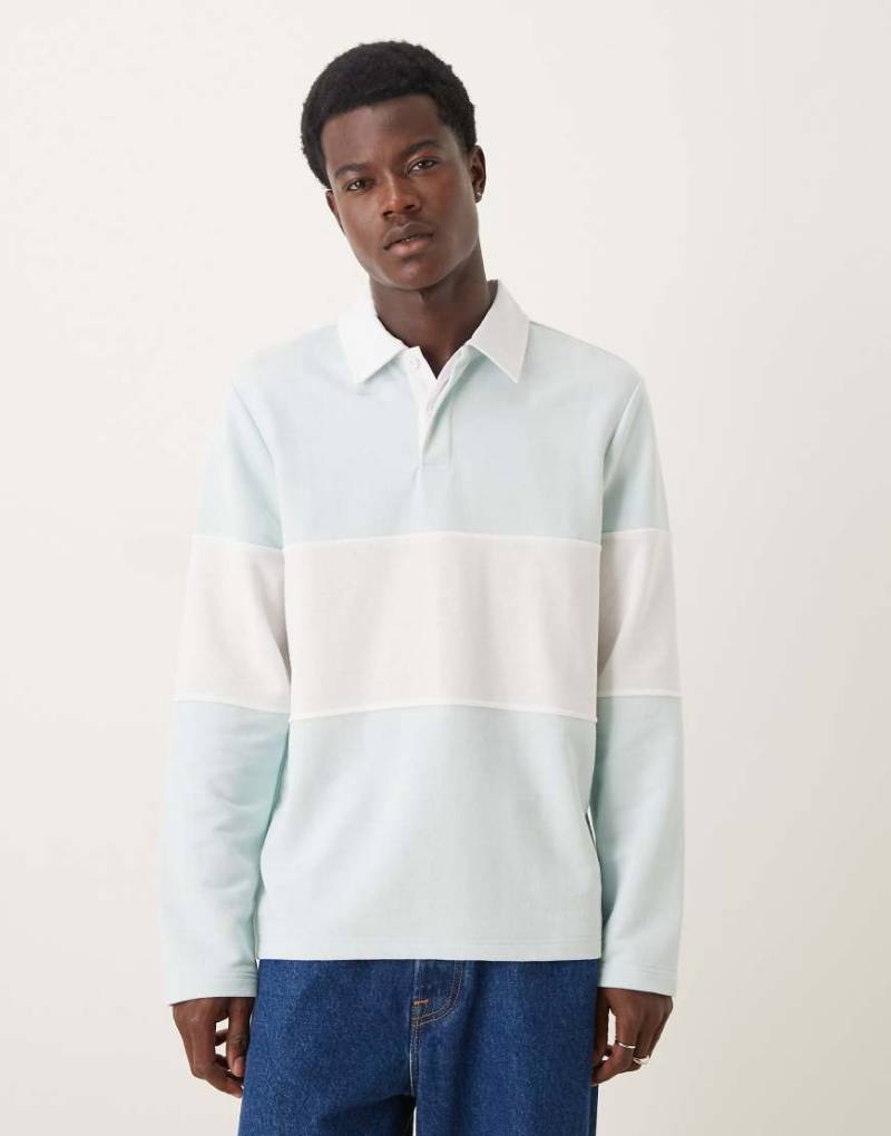 ASOS DESIGN - Rugby-Shirt mit Kontrasteinsatz in Blau von ASOS DESIGN