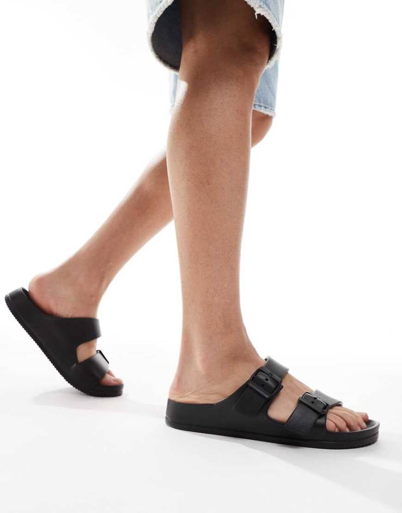 ASOS DESIGN - Sandalen auf Gummi in Schwarz mit zwei Riemen von ASOS DESIGN
