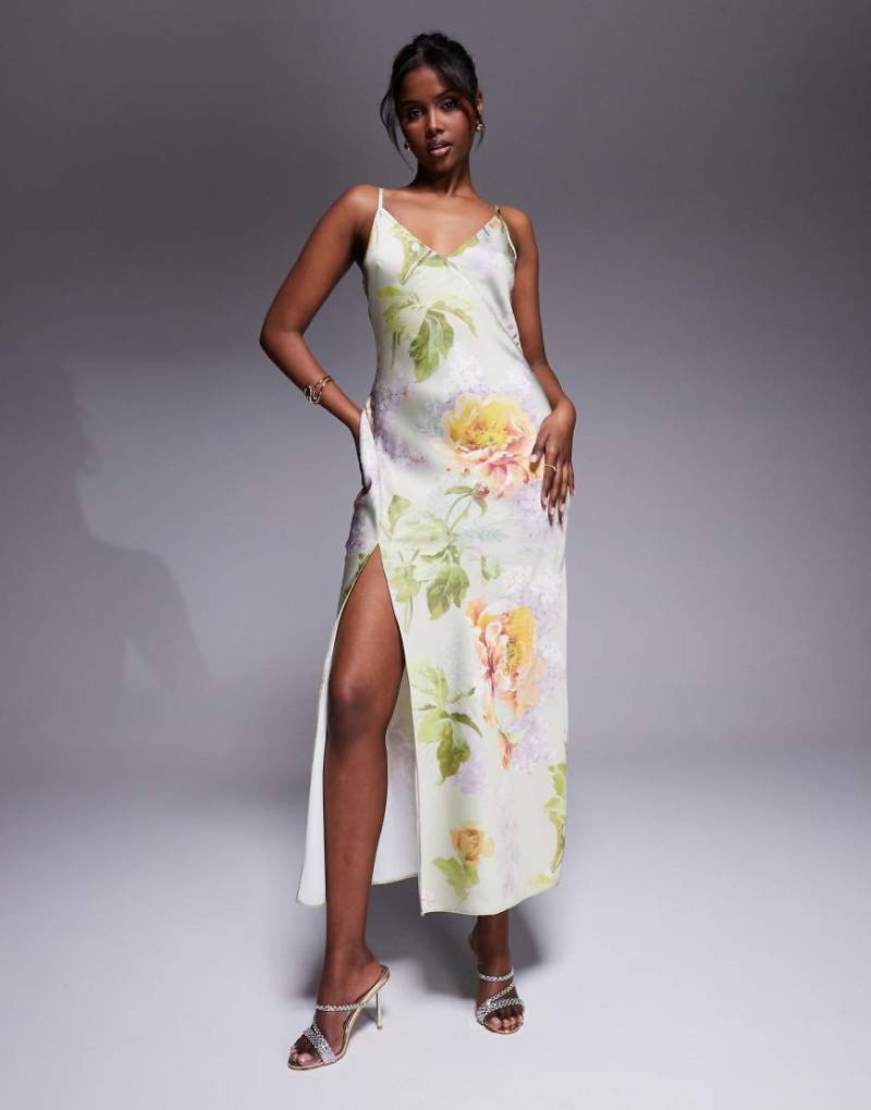 ASOS DESIGN - Wadenlanges Kleid aus Satin mit V-Ausschnitt, Ziernaht, Schlitz und grünem Blumenmuster von ASOS DESIGN
