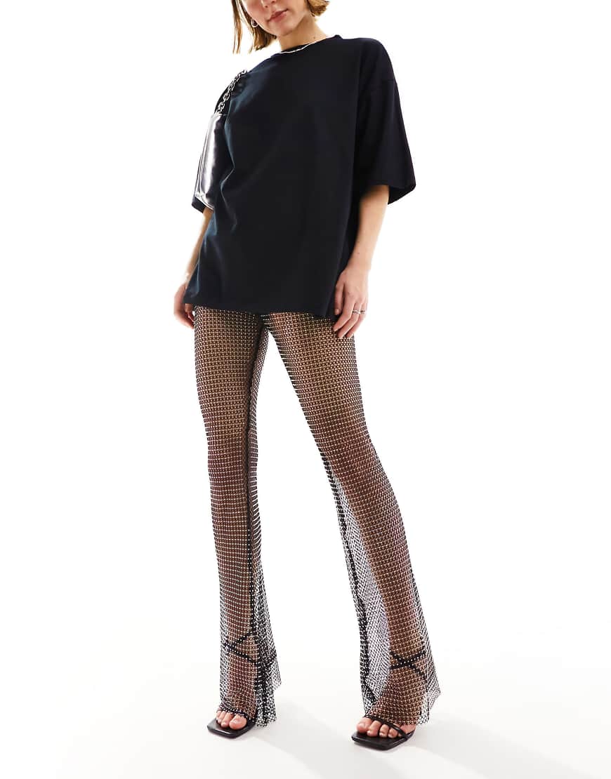 ASOS DESIGN - Schlaghose aus grobem Netzgewebe in Schwarz mit Strassverzierung ASOS DESIGN - Schlaghose aus grobem Netzgewebe in Schwarz mit Strassverzierung von ASOS DESIGN