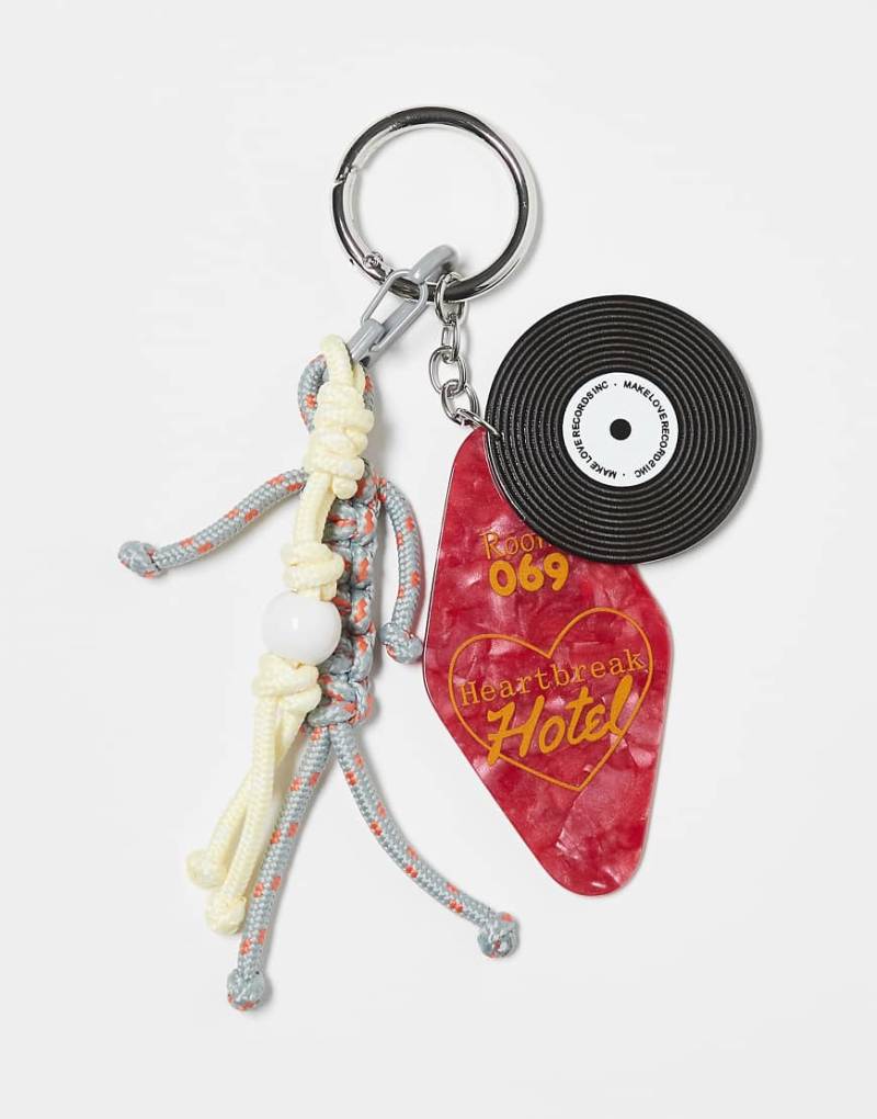 ASOS DESIGN - Schlüsselring mit bunten Taschenanhängern im Schallplatten- und Kordeldesign von ASOS DESIGN