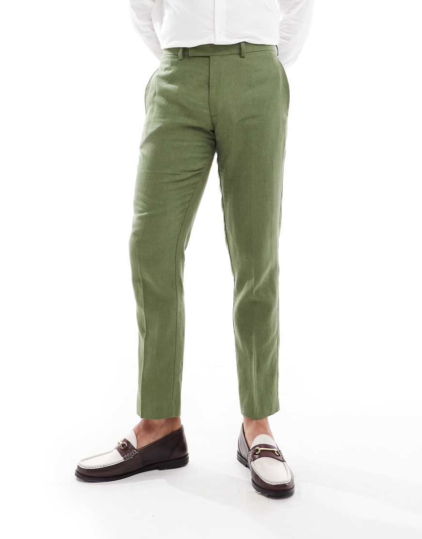 ASOS DESIGN - Schmal geschnittene Anzughose in Dunkelgrün mit Fischgrätmuster ASOS DESIGN - Schmal geschnittene Anzughose in Dunkelgrün mit Fischgrätmuster von ASOS DESIGN