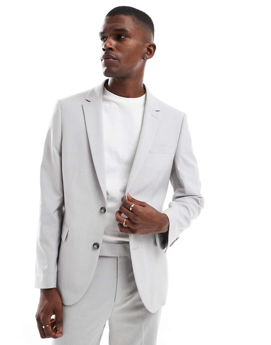 ASOS DESIGN - Schmal geschnittene Anzugjacke in Eisgrau ASOS DESIGN - Schmal geschnittene Anzugjacke in Eisgrau von ASOS DESIGN