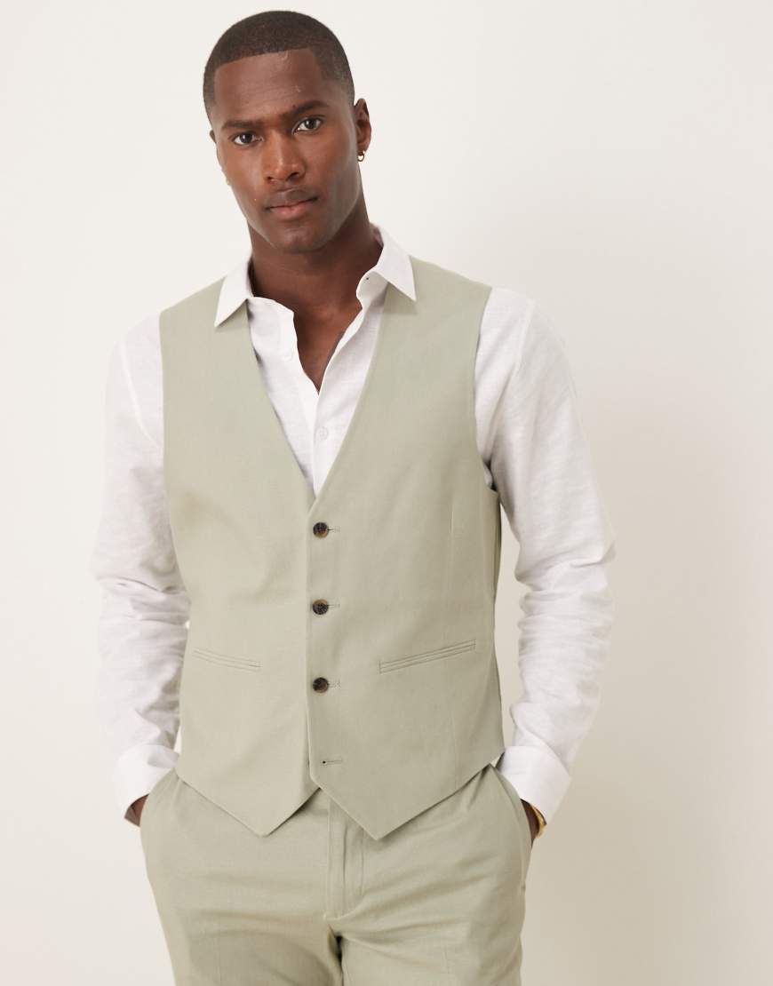 ASOS DESIGN - Schmal geschnittene Anzugweste aus Leinenmix in Salbeigrün ASOS DESIGN - Schmal geschnittene Anzugweste aus Leinenmix in Salbeigrün von ASOS DESIGN