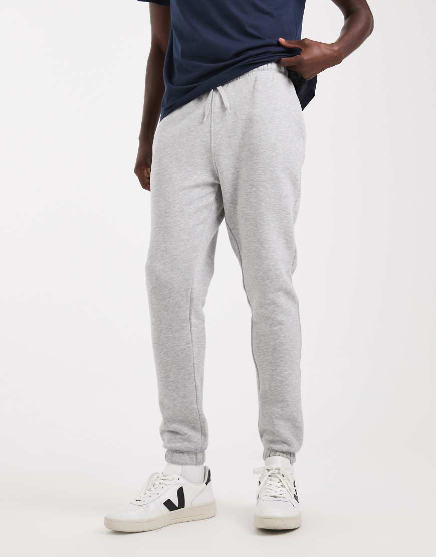 ASOS DESIGN - Schmal geschnittene Basic-Jogginghose in meliertem Grau von ASOS DESIGN