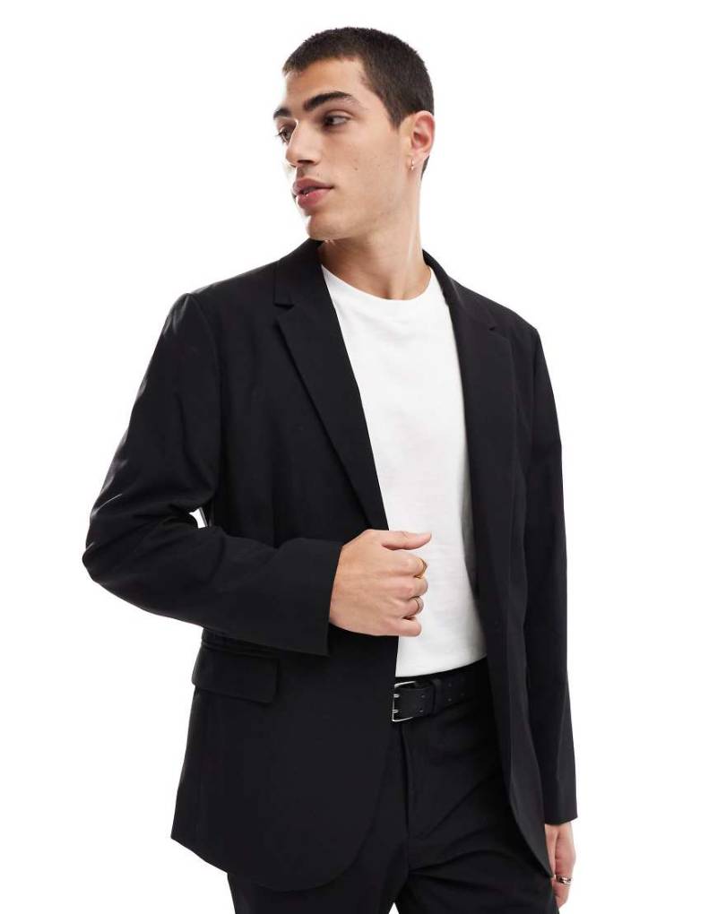 ASOS DESIGN - Schmal geschnittene Freizeit-Anzugjacke in Schwarz von ASOS DESIGN