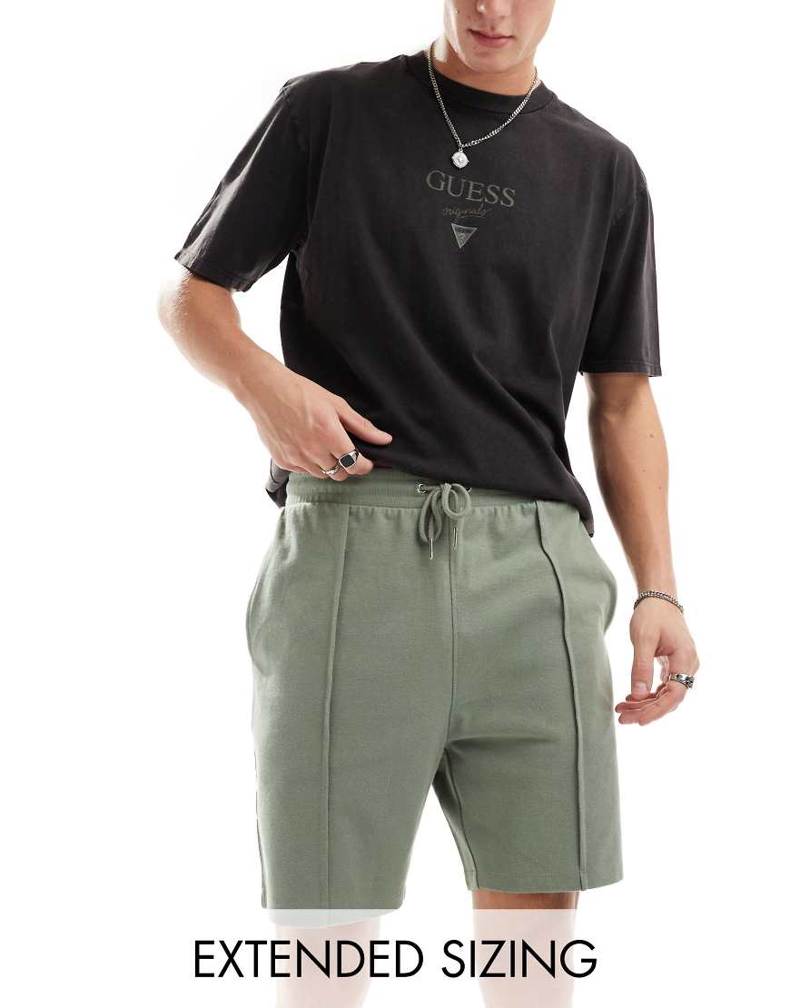 ASOS DESIGN - Schmal geschnittene Pikee-Shorts in Mittelgrün ASOS DESIGN - Schmal geschnittene Pikee-Shorts in Mittelgrün von ASOS DESIGN