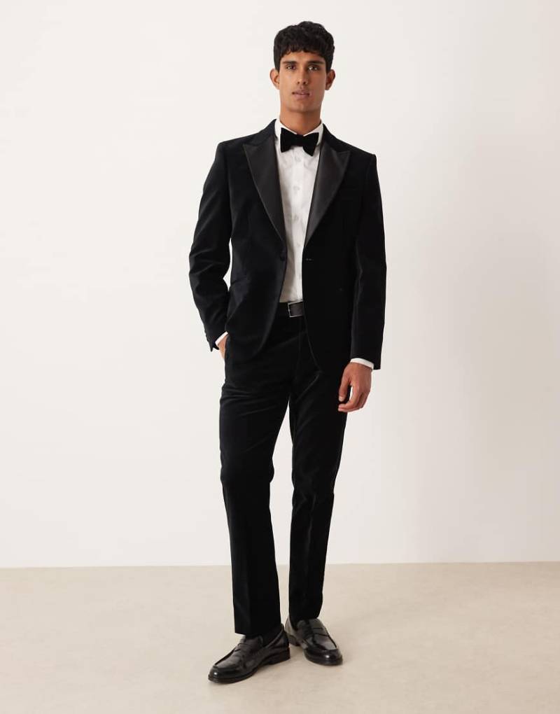 ASOS DESIGN - Schmal geschnittene Smoking-Anzughose aus Baumwoll-Samt in Schwarz von ASOS DESIGN