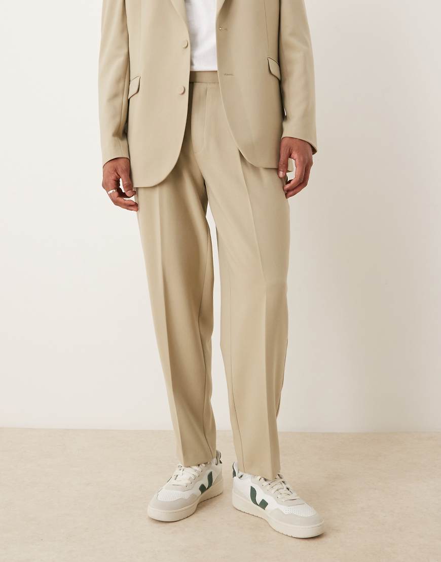 ASOS DESIGN - Schmal zulaufende, Oversize-Anzughose in Stein-Grün ASOS DESIGN - Schmal zulaufende, Oversize-Anzughose in Stein-Grün von ASOS DESIGN