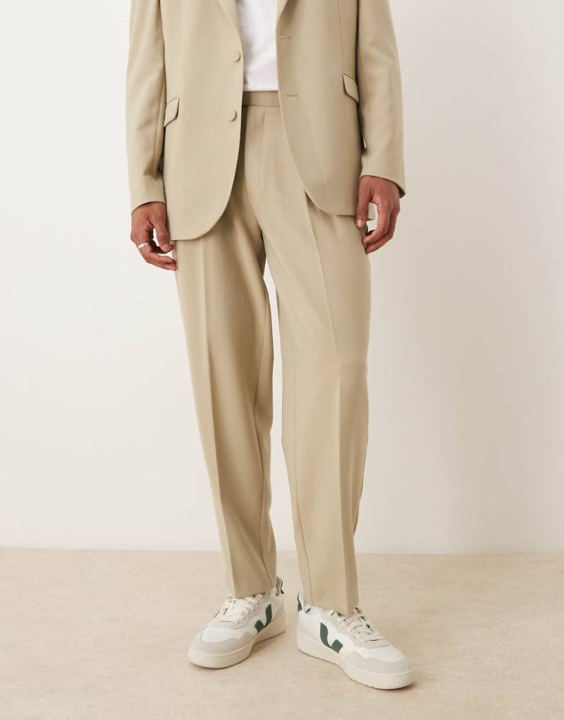 ASOS DESIGN - Schmal zulaufende, Oversize-Anzughose in Stein-Grün von ASOS DESIGN