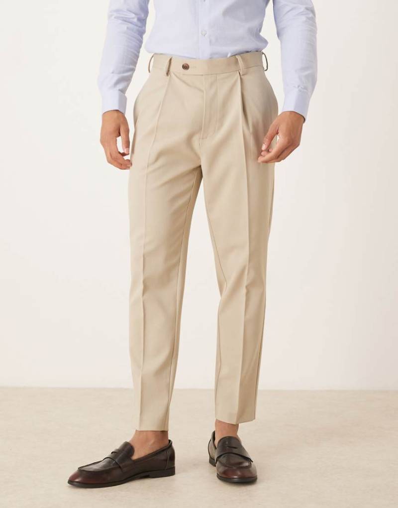 ASOS DESIGN - Schmal zulaufende, elegante Chino-Hose in Beige-Neutral von ASOS DESIGN
