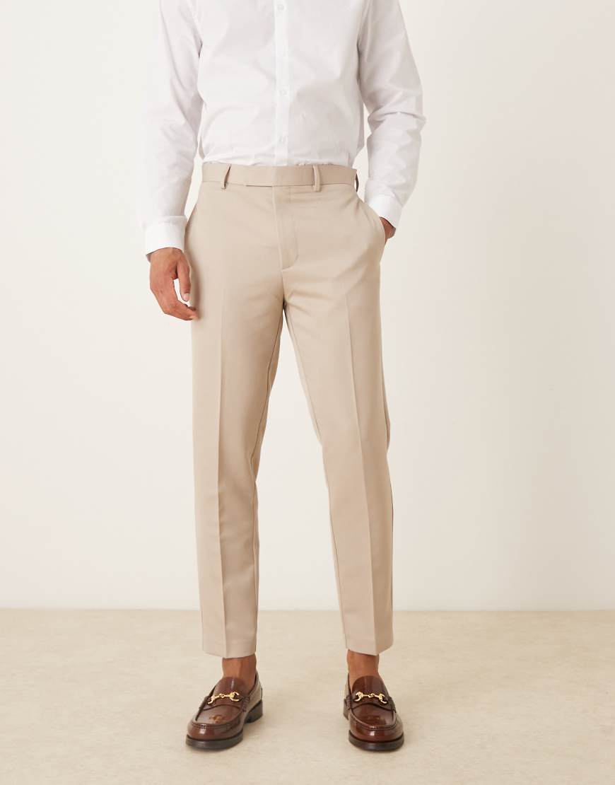 ASOS DESIGN - Schmal zulaufende, elegante Hose in Steinbeige-Neutral von ASOS DESIGN
