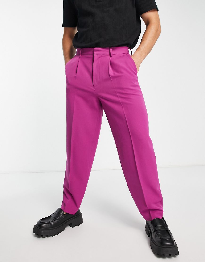 ASOS DESIGN - Schmal zulaufende, elegante Oversize-Hose in mittleren Violett-Lila ASOS DESIGN - Schmal zulaufende, elegante Oversize-Hose in mittleren Violett-Lila von ASOS DESIGN